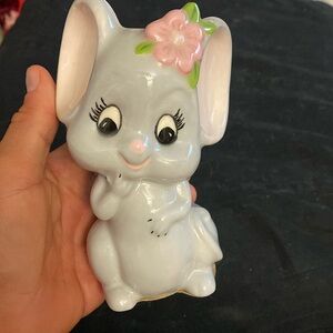 Vintage ceramic gray mouse with pink flower. Cartoon Disney style whimsy kitsch